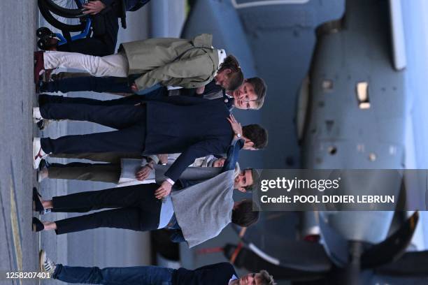 Olivier Vandecasteele pictured finally meeting his family during the arrival of Belgian humanitarian worker Olivier Vandecasteele who was released...