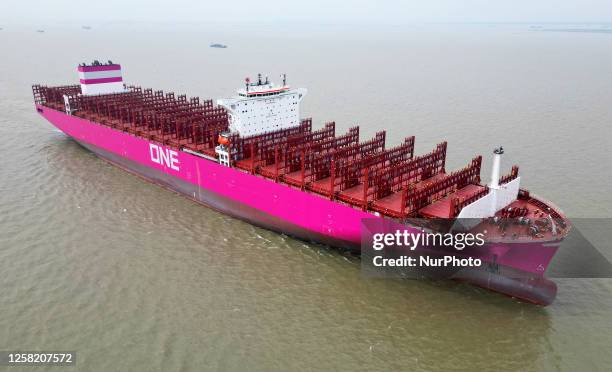 The 366-meter-long ONE FRUITION container ship leaves the dock after delivery in Suzhou, Jiangsu province, China, May 26, 2023. This is the third...