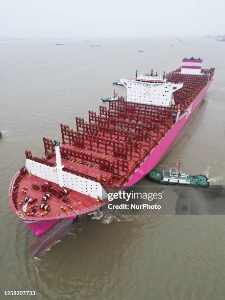 The 366-meter-long ONE FRUITION container ship leaves the dock after delivery in Suzhou, Jiangsu province, China, May 26, 2023. This is the third...