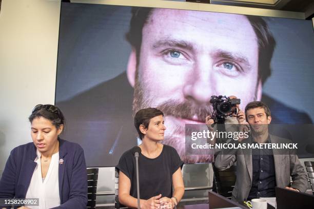 Mouna Ferdi, Marie Van Reet and legal adviser Olivier Van Steirtegem pictured during a press conference regarding the release of Belgian humanitarian...