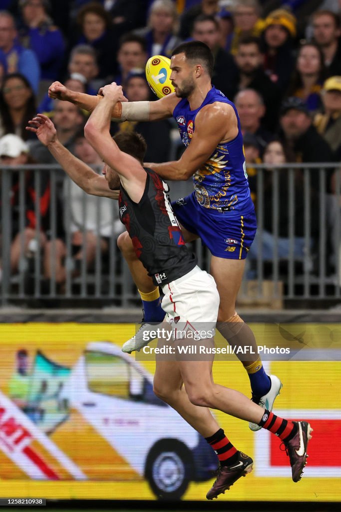 Josh Rotham Josh Rotham of the Eagles spoils during the 2023 AFL Round 11 match ...