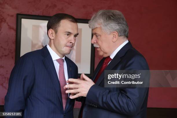 Russian bllionaire, businessman and Communist Party member Pavel Grudinin talks to Communist Party First Deputy Chairman Yuri Afonin at the party's...