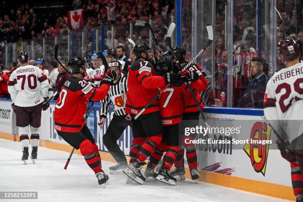 Canada celebrate after a goal scored by Adam Fantilli of Canada during the 2023 IIHF Ice Hockey World Championship Finland - Latvia game between...