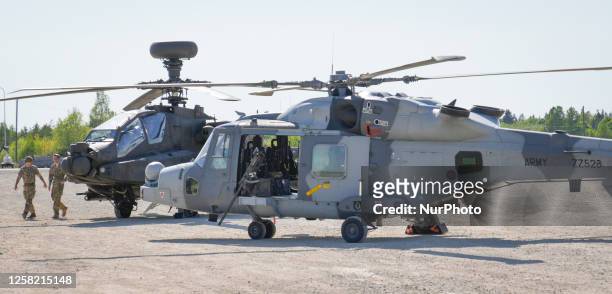 An Apache and a Wildcat helicopter belonging to the British Army Air Corps are seen in Tapa, Estonia on 20 May, 2023. Estonia is hosting the Spring...