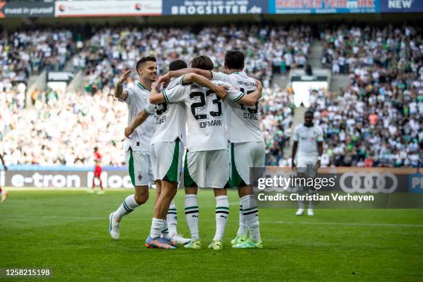 The Team of Borussia Moenchengladbach celebrate their teams second goal during the Bundesliga match between Borussia Moenchengladbach and FC Augsburg...