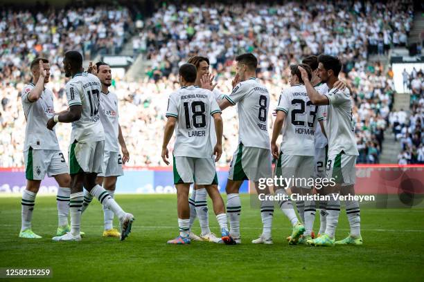 The Team of Borussia Moenchengladbach celebrate their teams second goal during the Bundesliga match between Borussia Moenchengladbach and FC Augsburg...