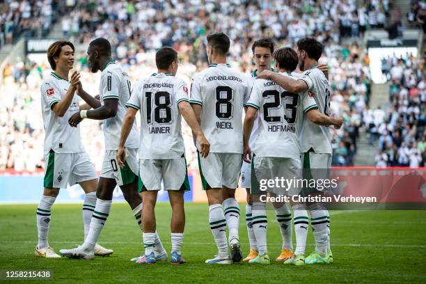 The Team of Borussia Moenchengladbach celebrate their teams second goal during the Bundesliga match between Borussia Moenchengladbach and FC Augsburg...
