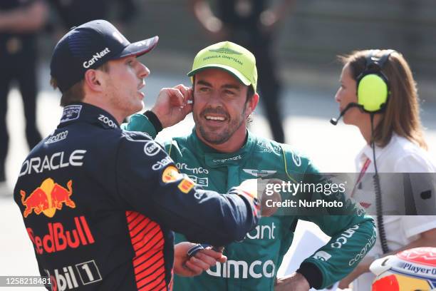 Max Verstappen of Red Bull Racing and Fernando Alonso of Aston Martin Aramco after qualifying ahead of the Formula 1 Grand Prix of Monaco at Circuit...