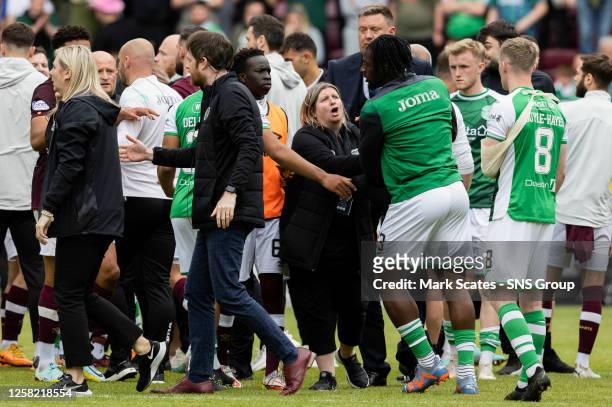 Players and staff from both teams clash after a cinch Premiership match between Heart of Midlothian and Hibernian at Tynecastle Park, on May 27 in...