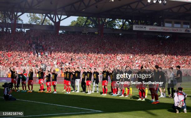 The team of Union Berlin celebrate their teams win during the Bundesliga match between 1. FC Union Berlin and SV Werder Bremen at Stadion an der...