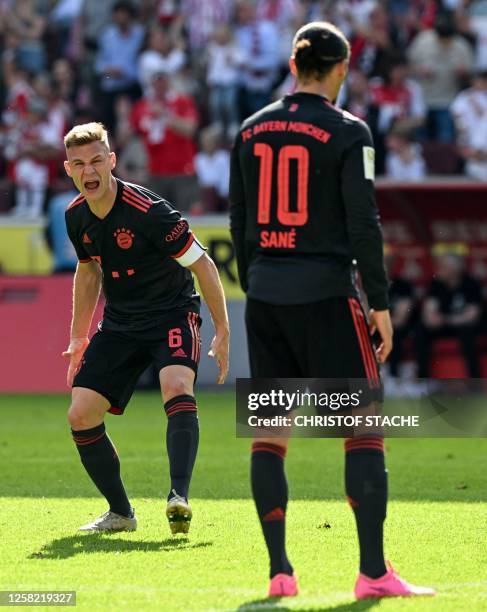 Bayern Munich's German midfielder Joshua Kimmich reacts during the German first division Bundesliga football match between FC Cologne and FC Bayern...