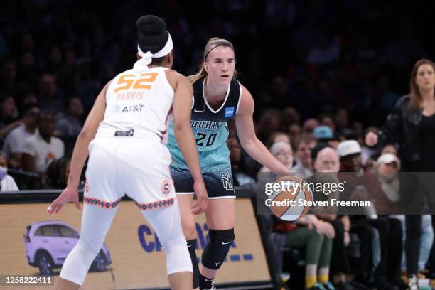 Sabrina Ionescu of the New York Liberty dribbles the ball during the game against the Connecticut Sun on May 27, 2023 in Brooklyn, New York. NOTE TO...