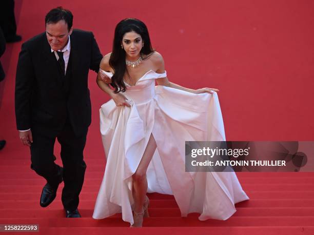 Film director Quentin Tarantino and Israeli singer Daniella Pick arrive for the Closing Ceremony and the screening of the film "Elemental" during the...