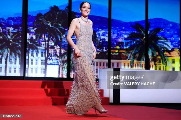 French actress and President of the Camera d'or jury Anais Demoustier arrives on stage to award the Camera d'Or Prize during the closing ceremony of...