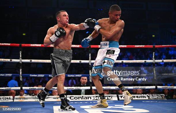 Belfast , United Kingdom - 27 May 2023; Nick Ball, left, in action against Ludumo Lamati during their WBC Silver Featherweight bout at the SSE Arena...