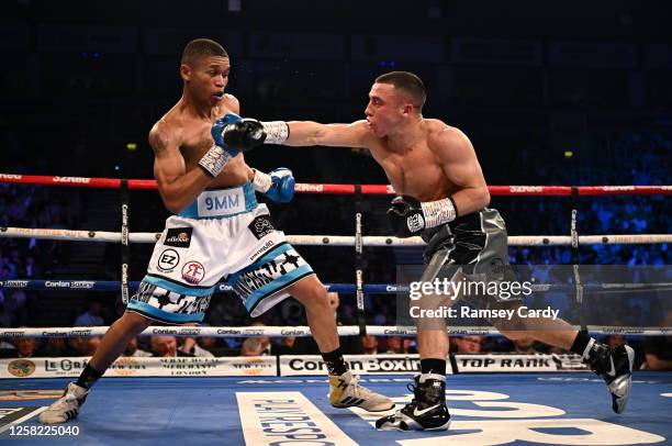 Belfast , United Kingdom - 27 May 2023; Nick Ball, right, in action against Ludumo Lamati during their WBC Silver Featherweight bout at the SSE Arena...