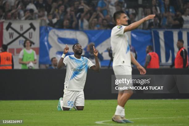 Marseille's Congolese defender Chancel Mbemba celebrates scoring the equalizing 1-1 goal during the French L1 football match between Olympique...