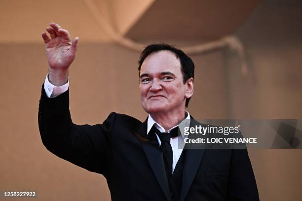 Director Quentin Tarantino waves as he arrives for the Closing Ceremony and the screening of the film "Elemental" during the 76th edition of the...