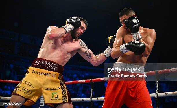 Belfast , United Kingdom - 27 May 2023; Padraig McCrory, left, in action against Diego Ramirez during their super-middleweight bout at the SSE Arena...