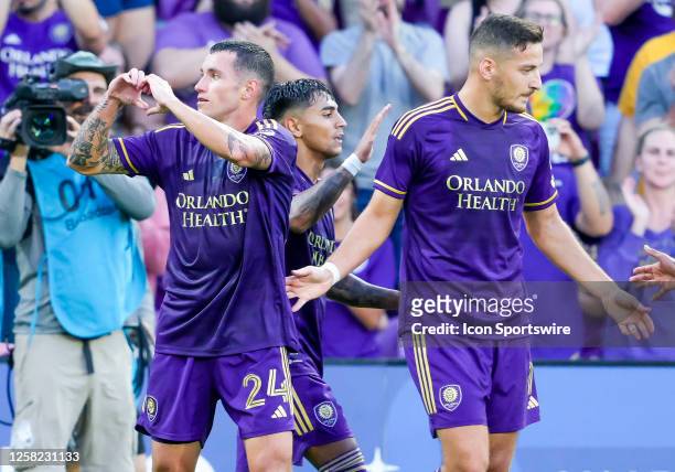 Orlando City defender Kyle Smith scores the first goal during the MLS soccer match between the Orlando City SC and Atlanta United FC onMay 27, 2023...
