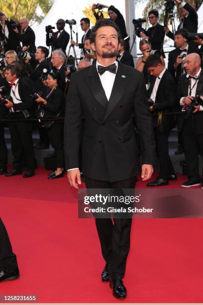 Orlando Bloom attends the "Elemental" screening and closing ceremony red carpet during the 76th annual Cannes film festival at Palais des Festivals...