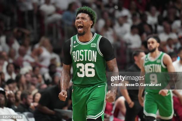 Marcus Smart of the Boston Celtics celebrates during Game Six of the Eastern Conference Finals against the Miami Heat on May 27, 2023 at the Kaseya...