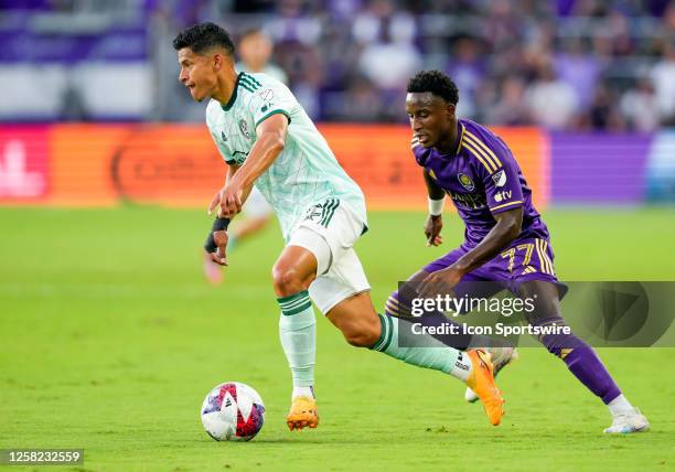 Atlanta United midfielder Matheus Rossetto runs with the ball during the MLS soccer match between the Orlando City SC and Atlanta United FC onMay 27,...