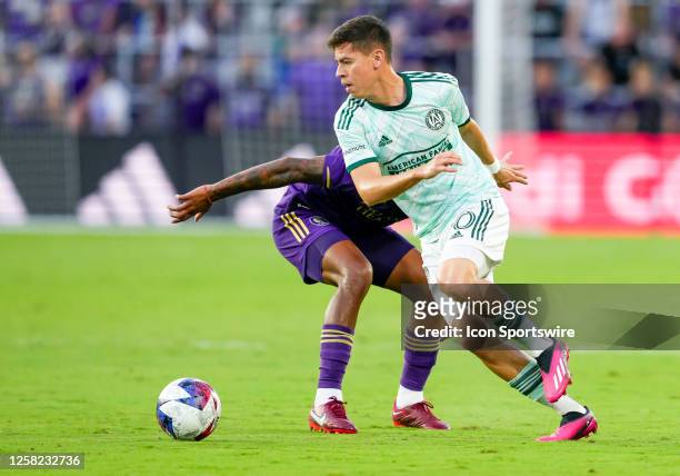 Atlanta United midfielder Matheus Rossetto runs with the ball during the MLS soccer match between the Orlando City SC and Atlanta United FC onMay 27,...