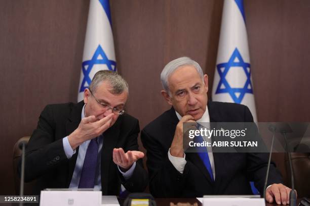 Israeli Prime Minister Benjamin Netanyahu and Minister of Justice Yariv Levin attend the weekly cabinet meeting in the prime minister's office in...