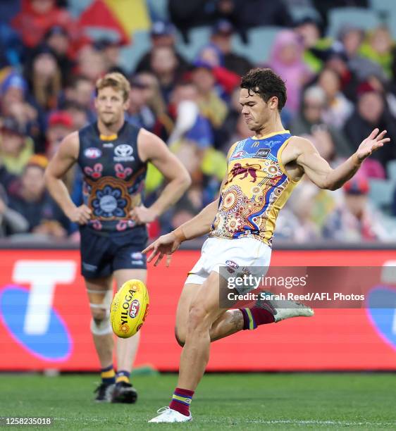Cam Rayner of the Lions kicks the ball during the 2023 AFL Round 11 match between the Adelaide Crows and the Brisbane Lions at Adelaide Oval on May...