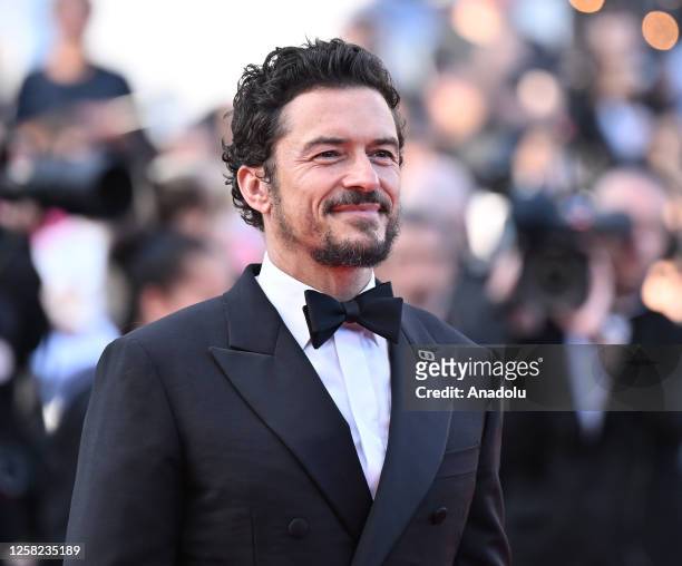 British actor Orlando Bloom arrives for the Closing Ceremony and the screening of the film "Elemental" during the 76th Cannes Film Festival at Palais...