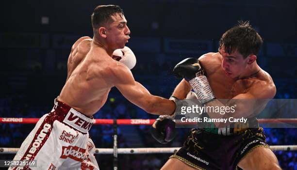 Belfast , United Kingdom - 27 May 2023; Luis Alberto Lopez, left, in action against Michael Conlan during their IBF Featherweight World Title bout at...