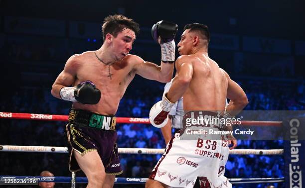 Belfast , United Kingdom - 27 May 2023; Michael Conlan, left, in action against Luis Alberto Lopez during their IBF Featherweight World Title bout at...