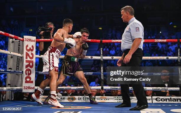 Belfast , United Kingdom - 27 May 2023; Michael Conlan, right, in action against Luis Alberto Lopez during their IBF Featherweight World Title bout...