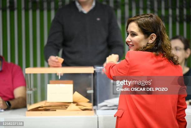 Partido Popular party's Madrid regional president candidate for her re-election Isabel Diaz Ayuso casts her ballot in a polling station in Madrid on...