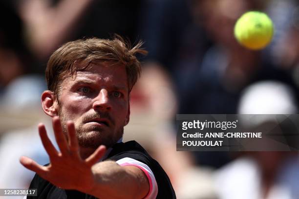 Belgium's David Goffin eyes the ball as he plays against Poland's Hubert Hurkacz during their men's singles match on day one of the Roland-Garros...