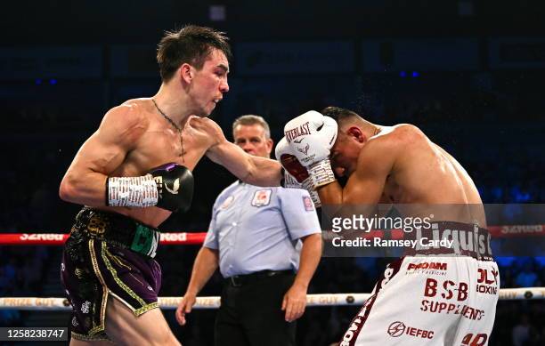 Belfast , United Kingdom - 27 May 2023; Michael Conlan, left, in action against Luis Alberto Lopez during their IBF Featherweight World Title bout...