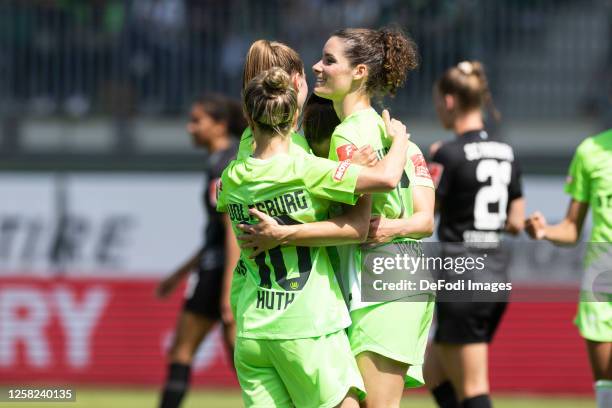 Dominique Janssen of VfL Wolfsburg celebrates after scoring her second teams goal during the FLYERALARM Women's National League match between VfL...