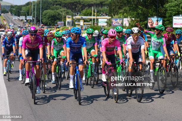 Bahrain - Victorious's Italian rider Jonathan Milan, wearing the best sprinter's cyclamen jersey , Groupama - FDJ's French rider Thibaut Pinot,...
