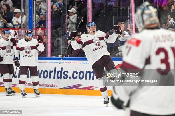 Kristians Rubins of Latvia celebrate after scoring a goal during the 2023 IIHF Ice Hockey World Championship Finland - Latvia game between USA and...