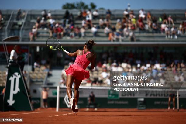 Canada's Leylah Fernandez plays a forehand return to Poland's Magda Linette during their women's singles match on day one of the Roland-Garros Open...