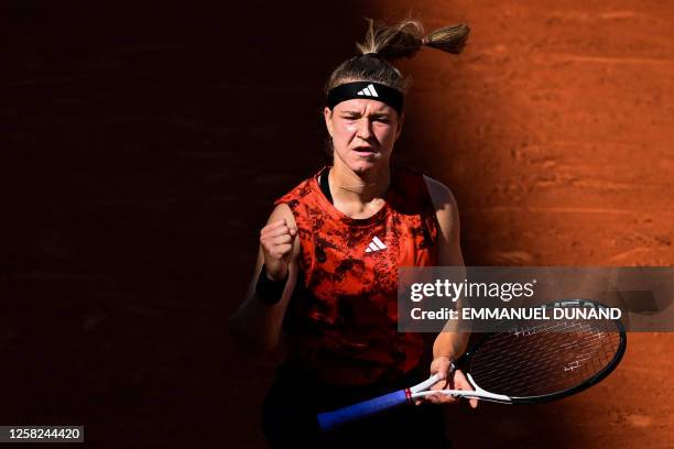 Czech Republic's Karolina Muchova reacts after a point to Greece's Maria Sakkari during their women's singles match on day one of the Roland-Garros...