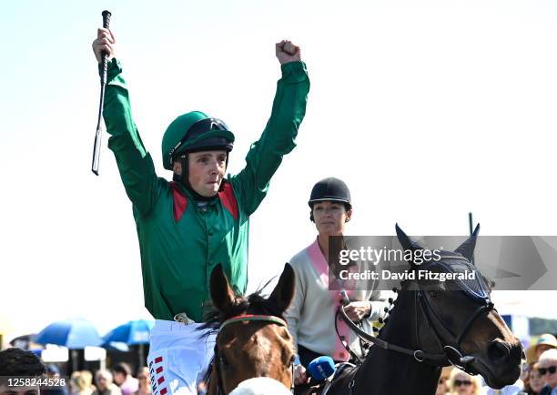 Kildare , Ireland - 28 May 2023; Chris Hayes celebrates on Tahiyra as they enter the parade ring after winning the Tattersalls Irish 1,000 Guineas...