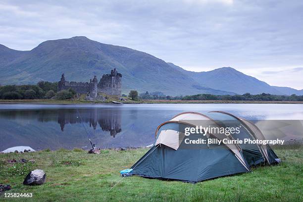 camping at castle kilchurn - tent stock pictures, royalty-free photos & images