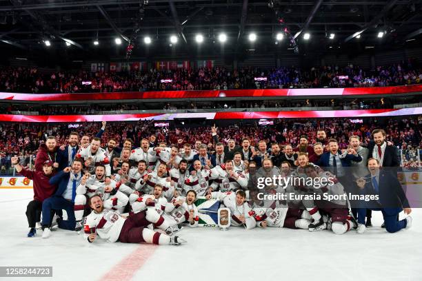 Latvia celebrate winning the bronze medal during the 2023 IIHF Ice Hockey World Championship Finland - Latvia game between USA and Latvia at Nokia...