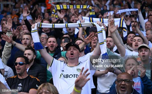 Leeds fans cheer on their team ahead of kick-off in the English Premier League football match between Leeds United and Tottenham Hotspur at Elland...
