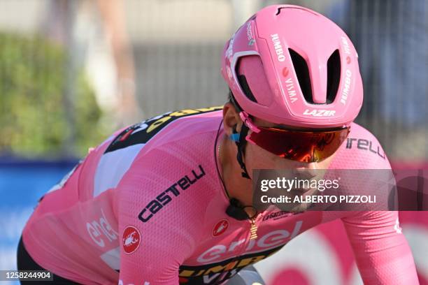 Overall leader Jumbo-Visma's Slovenian rider Primoz Roglic cycles during the twenty-first and last stage of the Giro d'Italia 2023 cycling race, 135...