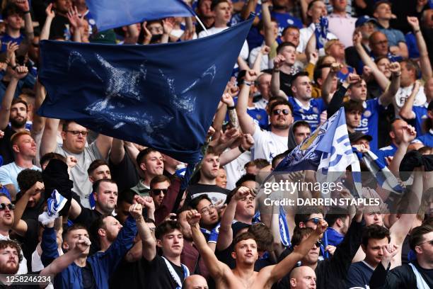 Leicester City's fans cheer for their team during the English Premier League football match between Leicester City and West Ham United at King Power...