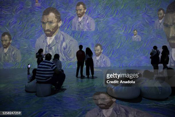 Visitors view the 'Van Gogh 360' Immersive Light and Shadow Exhibition in Gurugram, on the outskirts of New Delhi, India on May 28, 2023. The...