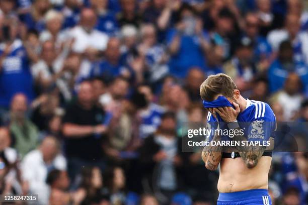 Leicester City's English midfielder James Maddison reacts during the English Premier League football match between Leicester City and West Ham United...